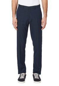 Marineblauwe broeken met een getailleerde pasvorm, met een vlakke voorkant, plooien en zijzakken. Gemaakt van een gladde stof, gecombineerd met casual sneakers.