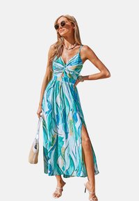 Maxi jurk met een twistfront, bloemenpatronen in teal en groen, verstelbare spaghettibandjes, zijsplit, lichte stof.