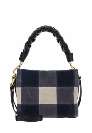 Small handbag with braided black handle, gold hardware, and patchwork design in gray, navy, and beige suede squares.