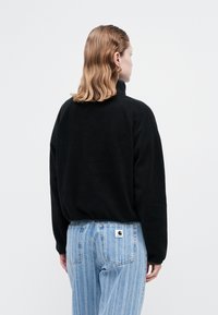 New Balance HALF ZIP - Flīsa džemperis - black