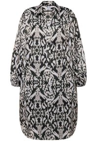 Vestito a camicia lungo con maniche a sbuffo, in bianco e nero, con colletto, bottone e polsini elasticizzati. Tessuto liscio con finitura lucida.