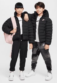 Nike Sportswear UNISEX - Zimska jakna - black