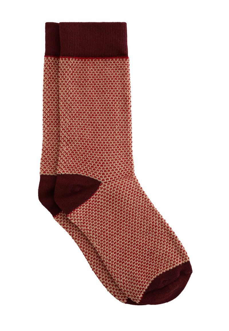 Stickade strumpor med en vinröd stuk och tå, med ett strukturerat bikupemönster i beige och vinröd. Hållbart tyg med en bekväm passform.