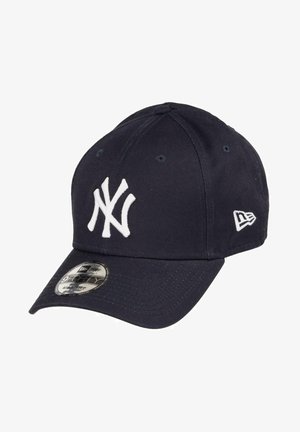 Navy blue cap made of cotton, featuring a raised white embroidered 'NY' logo on the front, curved brim, and six ventilation eyelets.