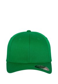 Roheline puuvillane müts, millel on struktureeritud disain, kumer ääreosa ja silmade detailid. Visiiri peal on läikiv logostikker.