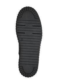Semelle de chaussure en caoutchouc noir avec une surface texturée et des profondeurs accentuées, présentant des bords dentelés et une section circulaire lisse au niveau du talon.