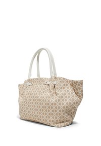 Beige laukku, jossa on valkoinen soikio-kuvio, kaksinkertaiset valkoiset kahvat ja teksturoitu pinta. Varustettu yläosassa sulkemisella, jossa on hienovaraisia varusteita.