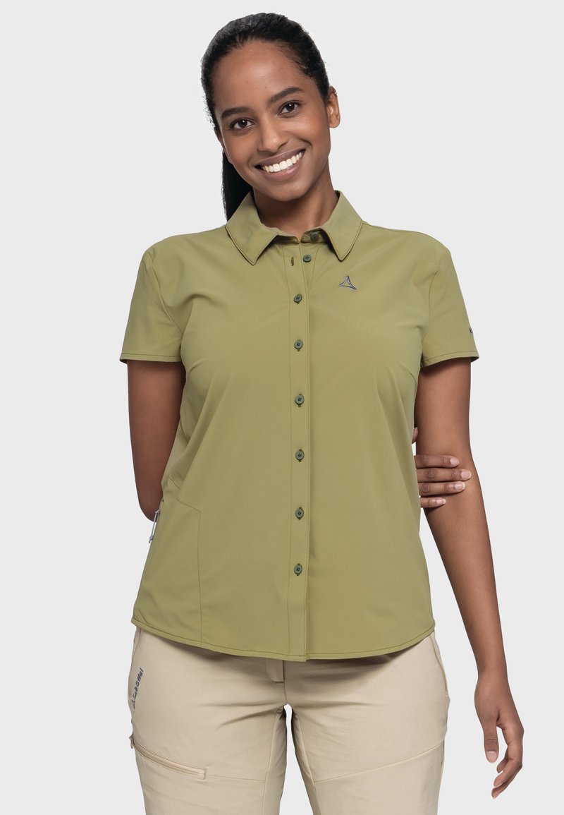 Short-sleeve olive green shirt with a collar, button-down front, side pockets, and a small logo accent on the chest. Smooth texture.
