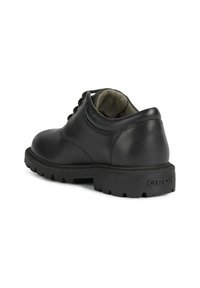 Scarpe in pelle nera con punta arrotondata, design con lacci e suola in gomma testurizzata. Include un logo discreto sul tallone.