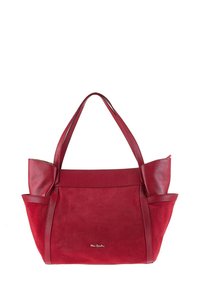 Sac fourre-tout en cuir rouge avec des accents en daim et en texture, offrant des poignées doubles et un design structuré. Détail de nœud notable sur un côté.