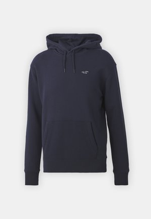 Navy blue hoodie made of cotton blend, featuring a kangaroo pocket, adjustable drawstring hood, and a small logo on the chest. Soft texture.