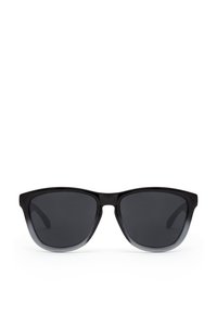 Mustat aurinkolasit tyylikkäällä kissansilmämuodolla, joissa on tummat linssit ja läpikuultava liukuvärikehys.