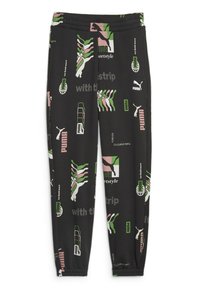 Svarta svettbyxor med varierade mönster och grafik i rosa, grön och vit. Elastisk midja och avsmalnande ben.