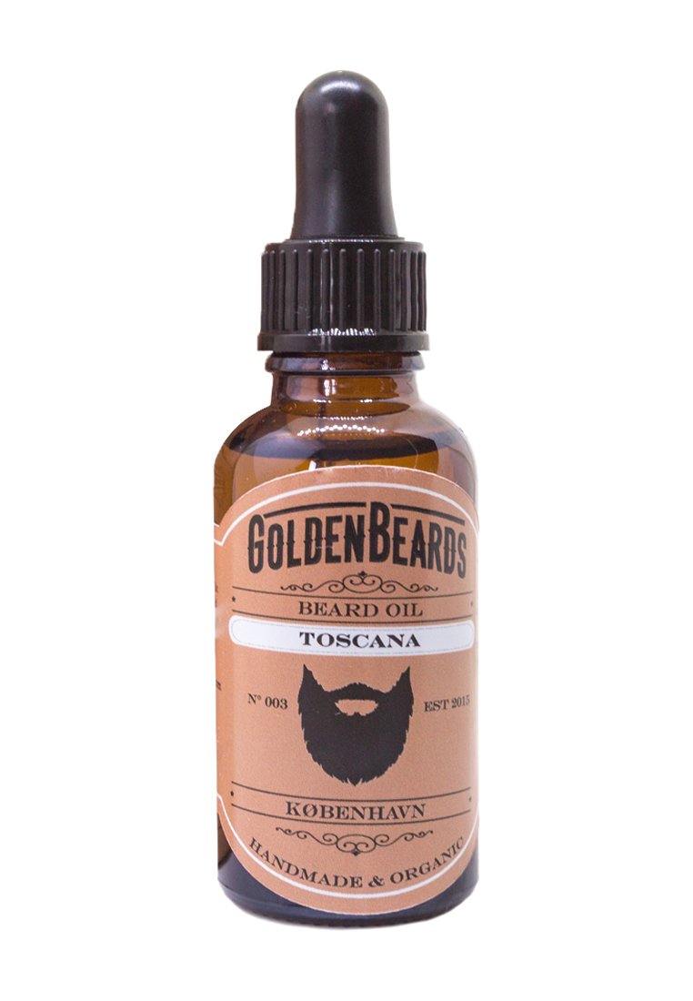 Bärnstensfärgad glasdropperflaska med svart lock. Etiketten har bruna och vita färger med texten "Golden Beards", "Beard Oil" och "Toscana".