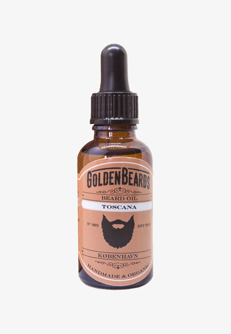 Amberfärgad glasdropperflaska med svart lock. Etiketten har bruna och vita färger med texten "Golden Beards", "Beard Oil" och "Toscana".