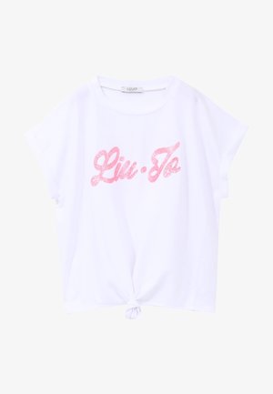 T-shirt bianca in cotone con maniche corte, orlo annodato e logo "Liu Jo" glitterato rosa sul davanti. Texture liscia, vestibilità rilassata.