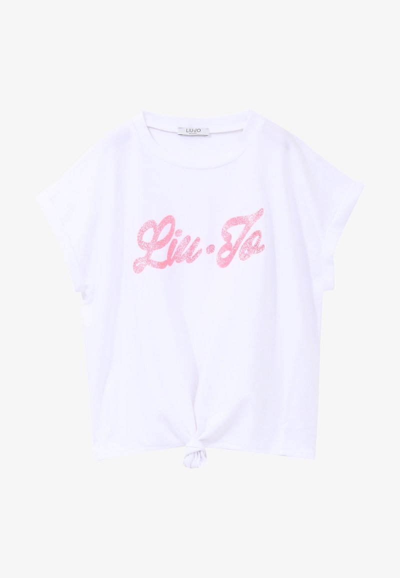 Biała bawełniana koszulka z krótkim rękawem, z węzłem na dole i różowym, błyszczącym logo "Liu Jo" z przodu. Gładka tekstura, luźny krój.