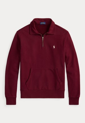Burgundy pullover sweatshirt made of soft fabric, featuring a half-zip collar, front kangaroo pocket, and embroidered logo on the chest.