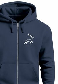 Navy blue zip-up hoodie made of soft fabric, featuring a white deer graphic on the chest. Includes a spacious front pocket and drawstring hood.