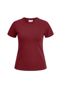 T-shirt bordeaux a maniche corte realizzato in morbido cotone, con scollatura rotonda e silhouette aderente. Senza schemi o loghi visibili.
