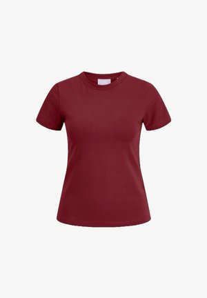 T-shirt bordeaux a maniche corte realizzato in morbido cotone, con scollatura rotonda e silhouette aderente. Senza schemi o loghi visibili.