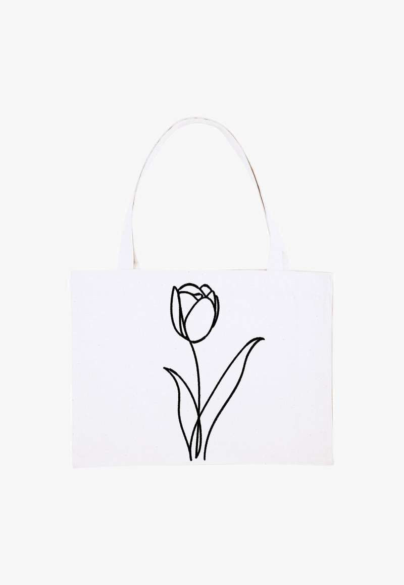 Witte draagtas met twee handvatten en een eenvoudige zwarte lijntekening van een tulp met steel en bladeren.