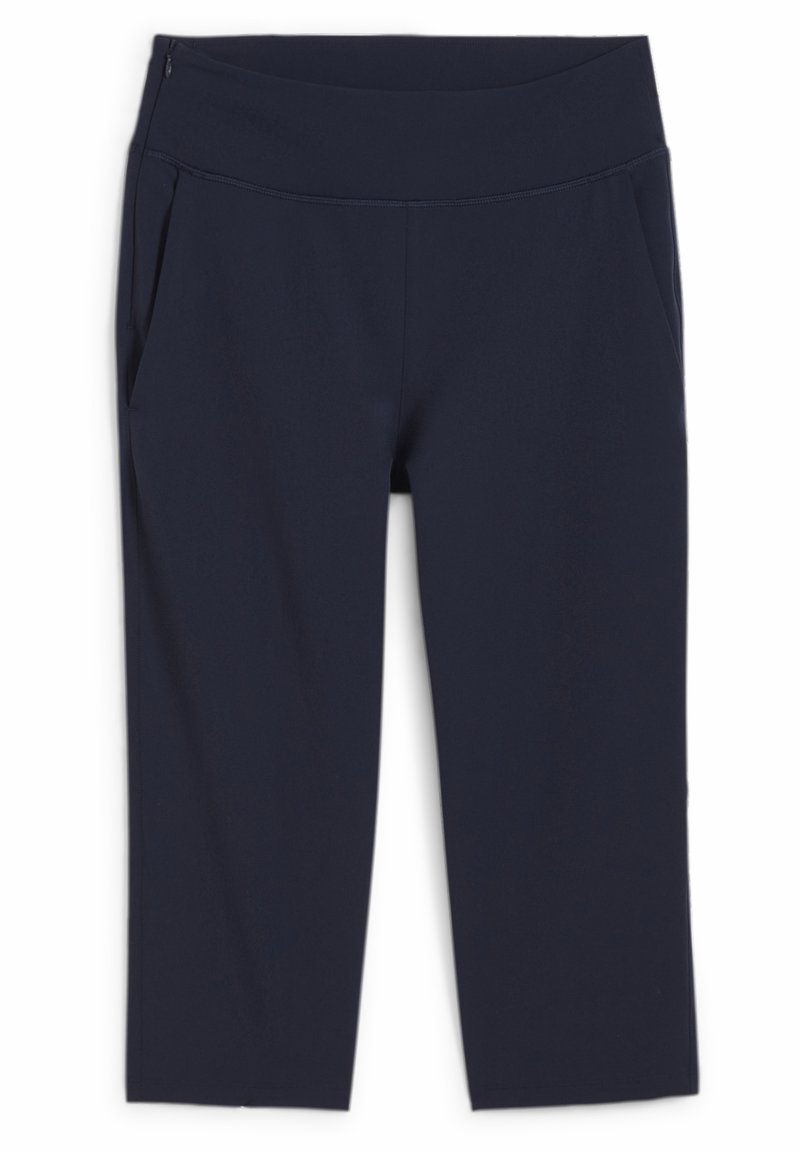 Pantaloni cropped navy realizzati in tessuto elasticizzato con una cintura larga, dotati di due tasche laterali e una texture liscia.