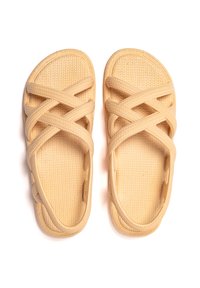 Yellow rubber sandals with a textured sole and crisscross straps. The design features ventilation holes on the sides for breathability.