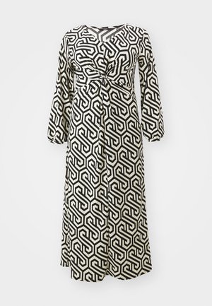 Φόρεμα γεωμετρικού τύπου σε ασπρόμαυρο χρώμα, με μακριά μανίκια, λεπτομέρεια ζωνάκι στη μέση, ρευστό ύφασμα, μήκους κάτω από το γόνατο.