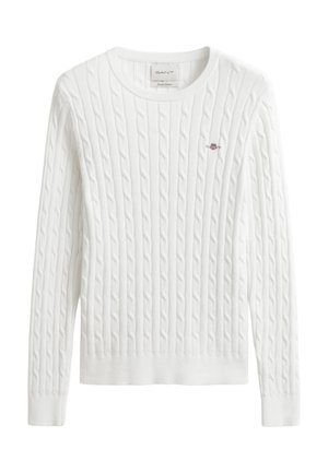 Bílý svetr s dlouhými rukávy, kulatým výstřihem a malým vyšitým logem na hrudi. Texturovaná látka nabízí klasický vzhled.