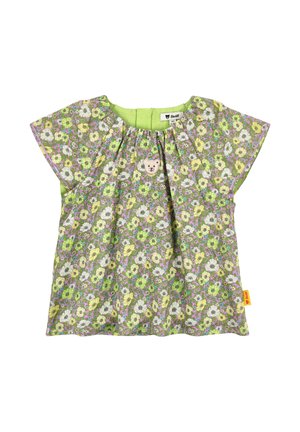 Floral short-sleeve top with green, purple, and yellow flowers on a gray background. Features a bear appliqué and pleated design.