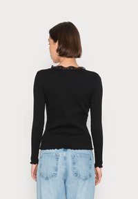 ONLY ONLMICHELA - Casaco de malha - black