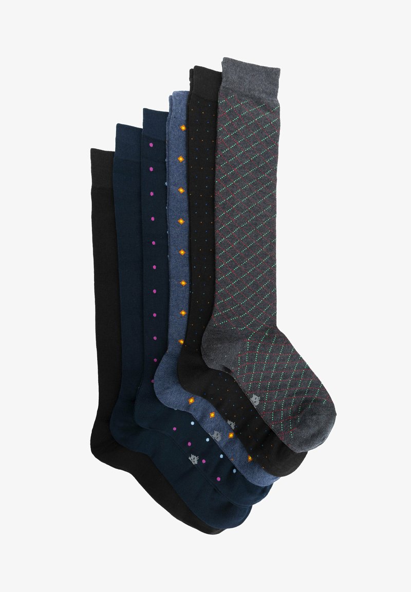 Set di sette paia di calzini, disponibili in vari colori: grigio scuro, blu navy, nero e opzioni fantasiose con pois e diamanti. Tessuto morbido, lunghezza a metà polpaccio.