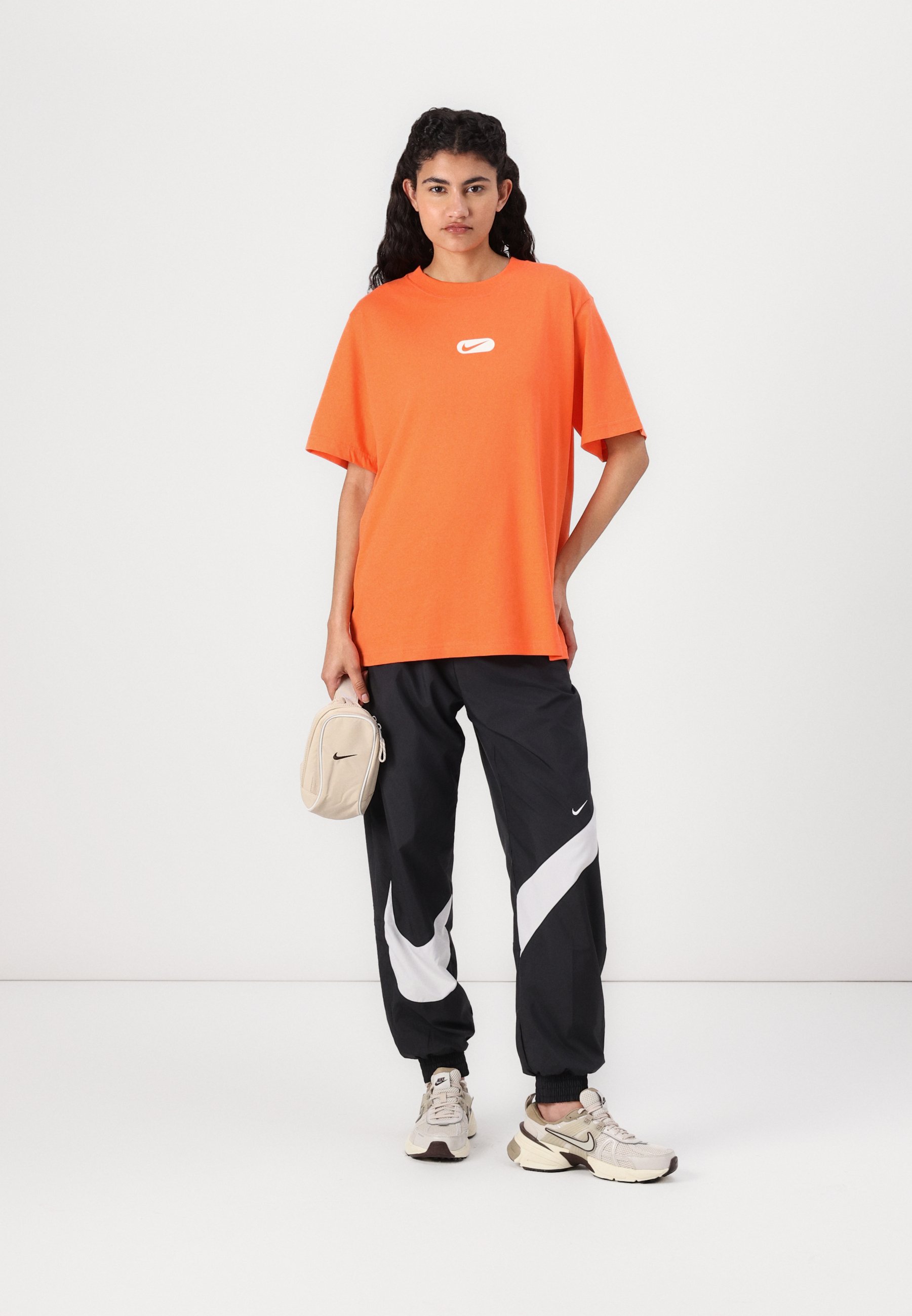 turf orange nike shirt