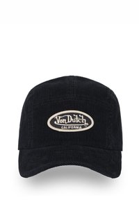 Casquette en velours côtelé noir avec une couronne arrondie, ornée d'un patch ovale crème avec le logo "Von Dutch CALIFORNIA" en texte noir.