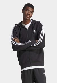 adidas Sportswear - ESSENTIALS FRENCH  3-STRIPES - Tröja med dragkedja - black   white Miniatyrbild 1