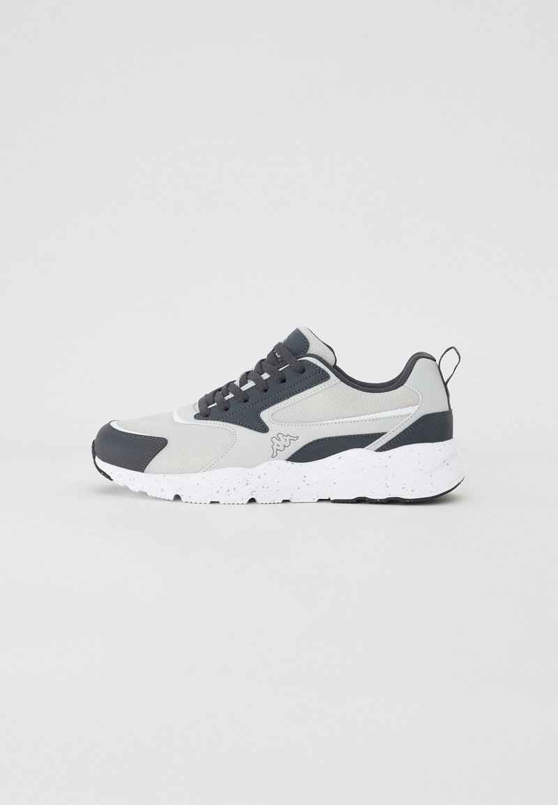 Athletic sneaker with a grey and black mesh upper, contrasting rubber accents, and a white speckled sole. Features round laces and a pull tab.