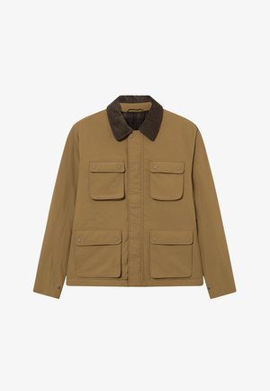 Pruun puuvillane jakk, millel on kotiriidest krae, kaks rinna taskut ja sile tekstuur. Ees nupuga sulgemine ja pikad varrukad.