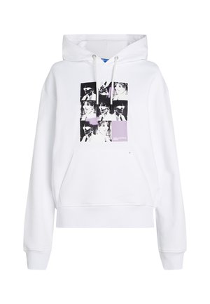 Felpa bianca con tasca frontale, caratterizzata da un collage di stampe grafiche in bianco e nero e accenti viola. Include cordini e polsini a coste.