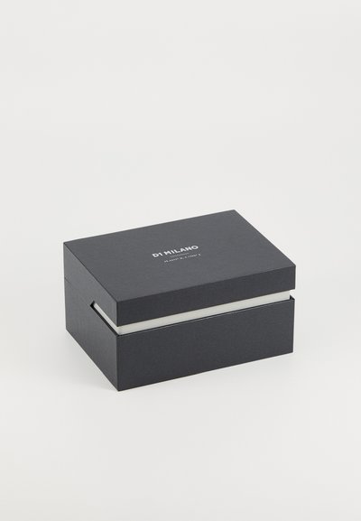 Black rectangular gift box featuring a smooth texture, minimalistic design, and silver logo "DI MILANO" printed on the lid.
