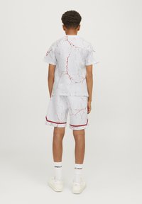 Jack & Jones Performance JJKEY LOOSE TEE CREW JNR - Marškinėliai su spaudiniu - white