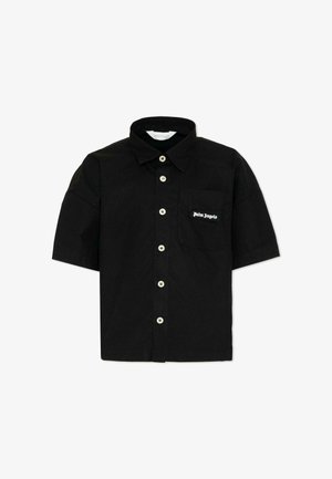 Chemise noire à manches courtes avec boutons blancs et une poche poitrine ornée d'un patch logo « Palm Angels ».