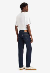 Levi's® 502® TAPER - Traperice suženog kroja - moonlit rinse cool