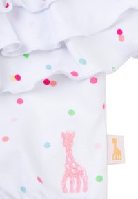 Tessuto bianco con pois colorati in rosa, verde e blu; presenta una giraffa ricamata in rosa e un'accattivante balza nella parte superiore.