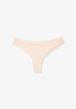 Stringe pour femme beige clair avec bordure en dentelle, présenté à plat sur fond blanc.