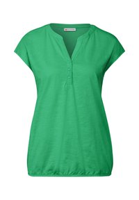 Zelený krátký rukáv henley top s rozepínáním, třemi knoflíky a volným střihem. Vyrobeno z lehké, mírně texturované tkaniny.