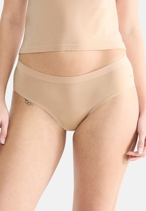 Beige cotton blend Hipster underwear with a smooth texture, wide elastic waistband, and seamless design for comfort and fit.