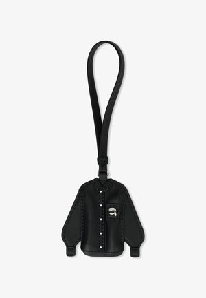 Black leather keychain shaped like a long-sleeve shirt, featuring a pocket flap, silver accents, and stitched detailing along edges.