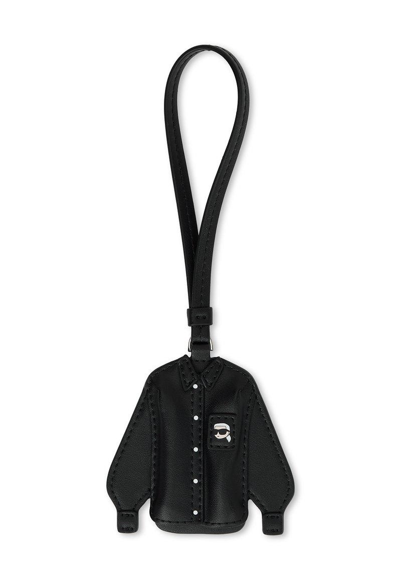 Black leather keychain shaped like a long-sleeve shirt, featuring a pocket flap, silver accents, and stitched detailing along edges.