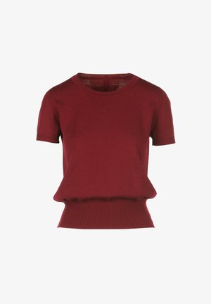 Bordo īsām piedurknēm esoša džemperis ar apaļu dekoltē, ribotu malu un brīvu piegriezumu. Izgatavots no mīksta adījuma materiāla. Vienkāršs, bezšuvju dizains.